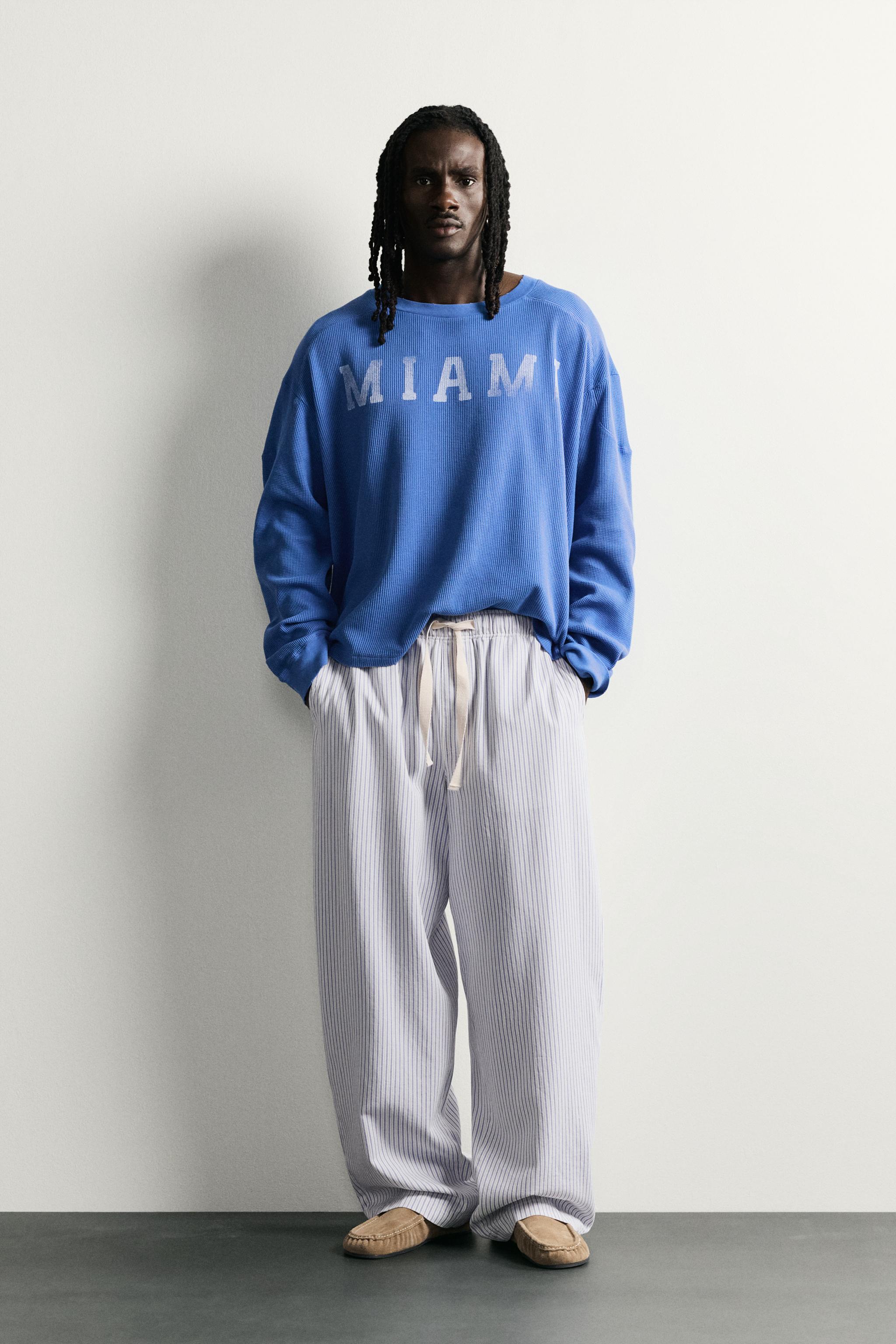 STRIPED WIDE FIT PANTS